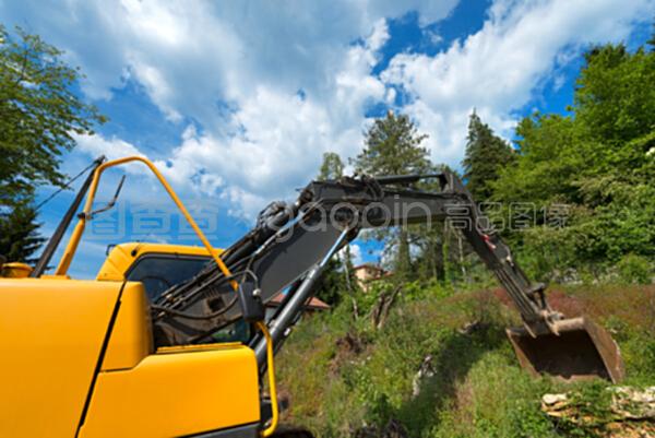 黃色和黑色挖掘機